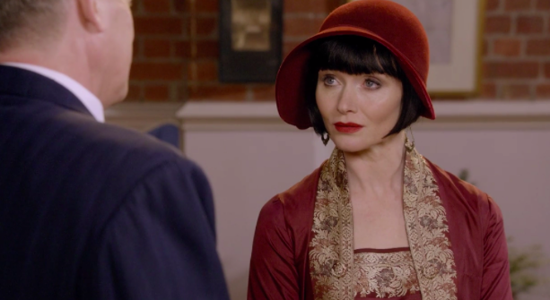 Screenshot from Season One, Episode 9, “Queen of Flowers”. Pictured: Phyrne Fisher being suspicious of this dude.